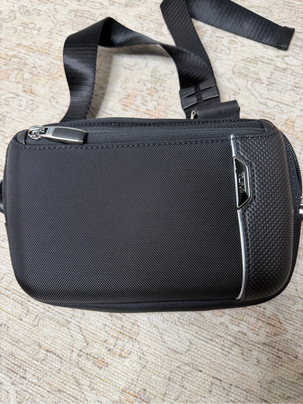 Tumi Black Men's Sling Belt Bag with Silver Accents